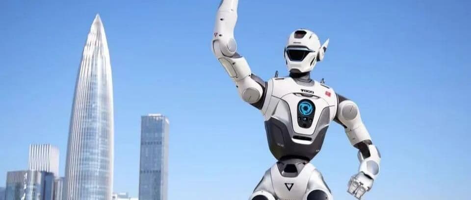 EngineAI humanoid robot standing in a modern lab, with engineers working on its torso and arms