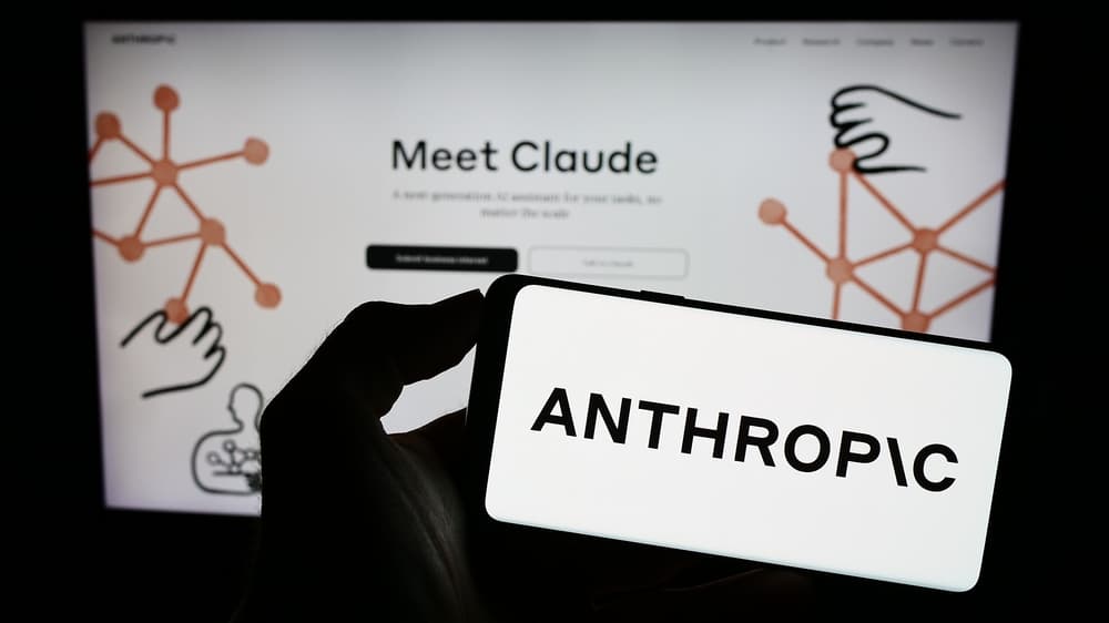 A person using a laptop with Anthropic's Claude AI interface open, showing a career mapping tool with ikigai diagram…