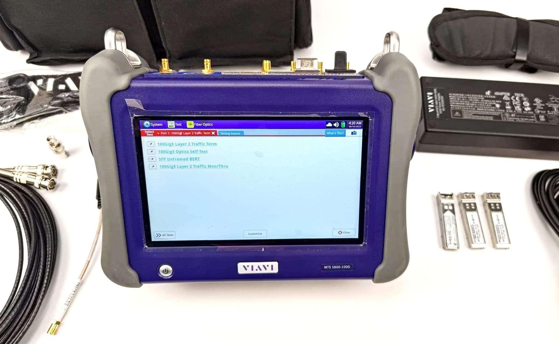 A VIAVI engineer connects an MTS-5800 handheld tester to a data center switch, validating 800GE and 1.6TE links for…