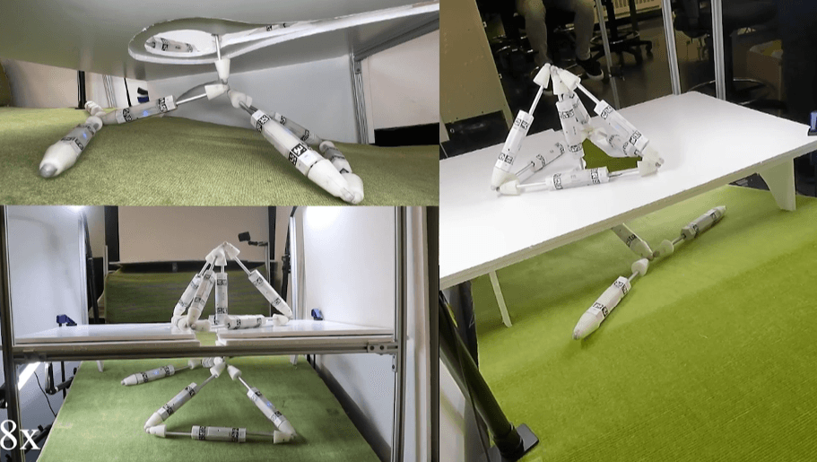 Two small cuboid robots with magnetic connectors on a white surface, one robot reaching toward the other to attach…