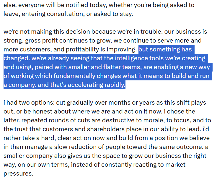 Jack Dorsey stands in a modern office, addressing employees as charts on a screen show workforce reduction from…