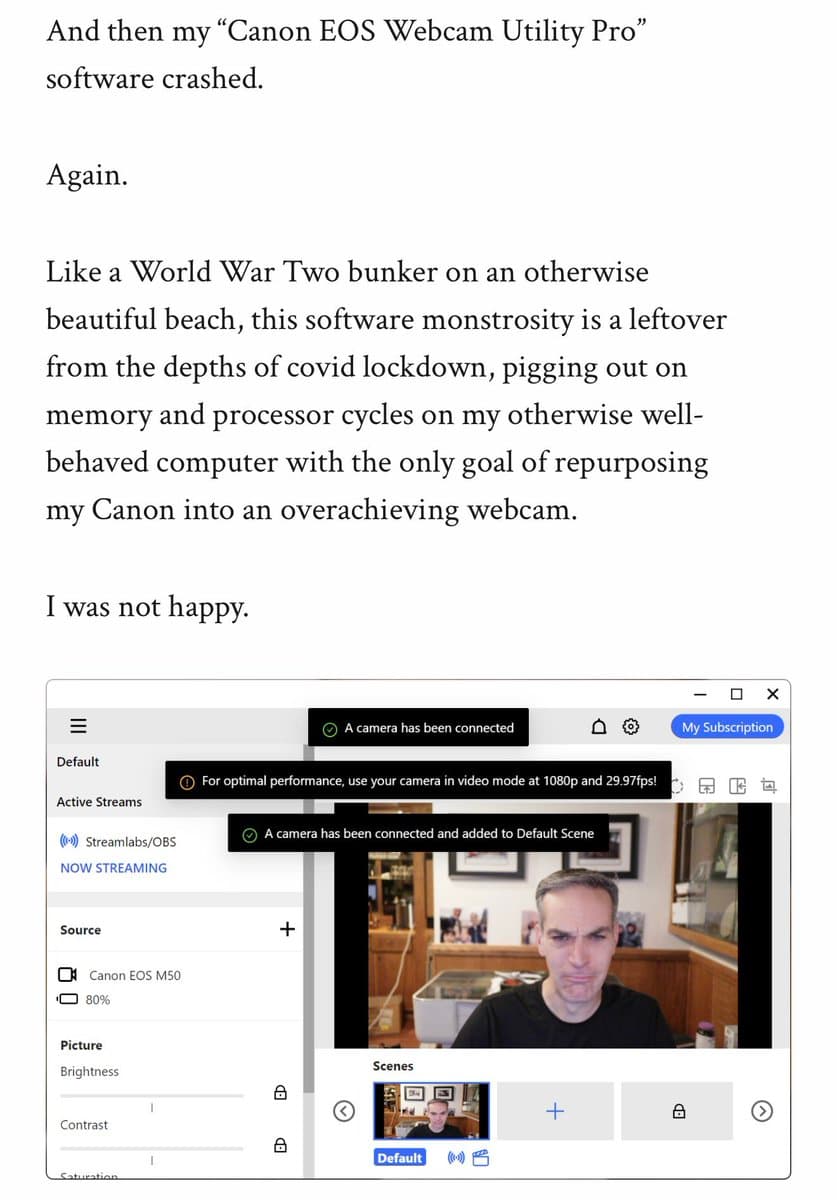 Developer at computer screen showing Rust code, with Canon webcam connected via USB, AI agent interface visible…