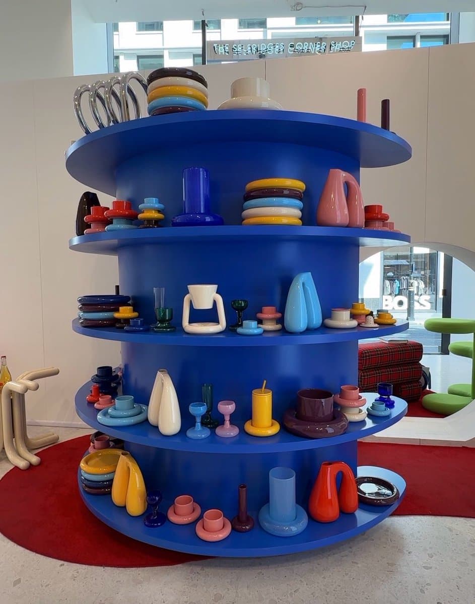 Colorful chunky furniture and accessories displayed in a bright pop-up shop at Selfridges London
