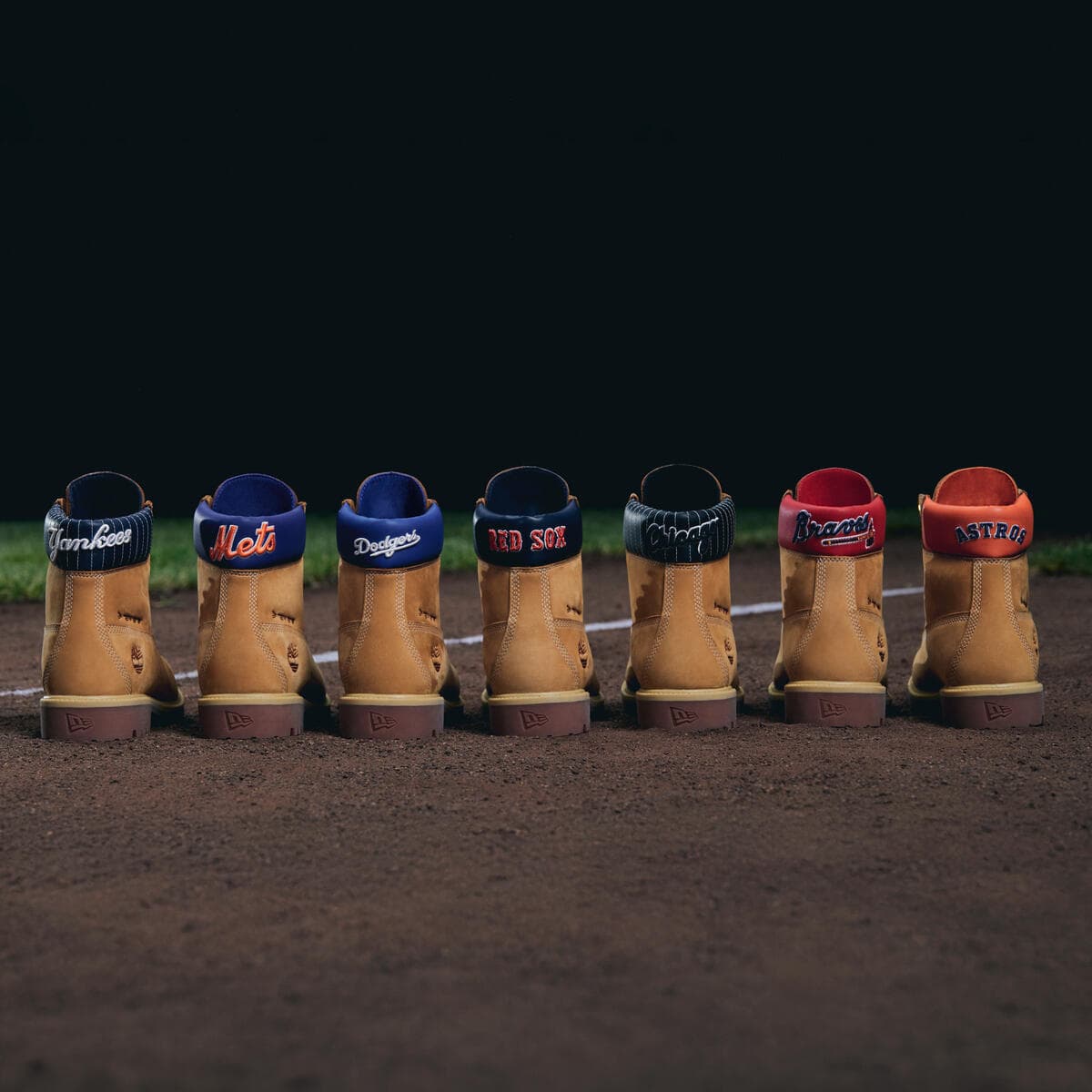 Baseball cap and rugged boot pair displayed together, showcasing MLB team logos on a neutral background