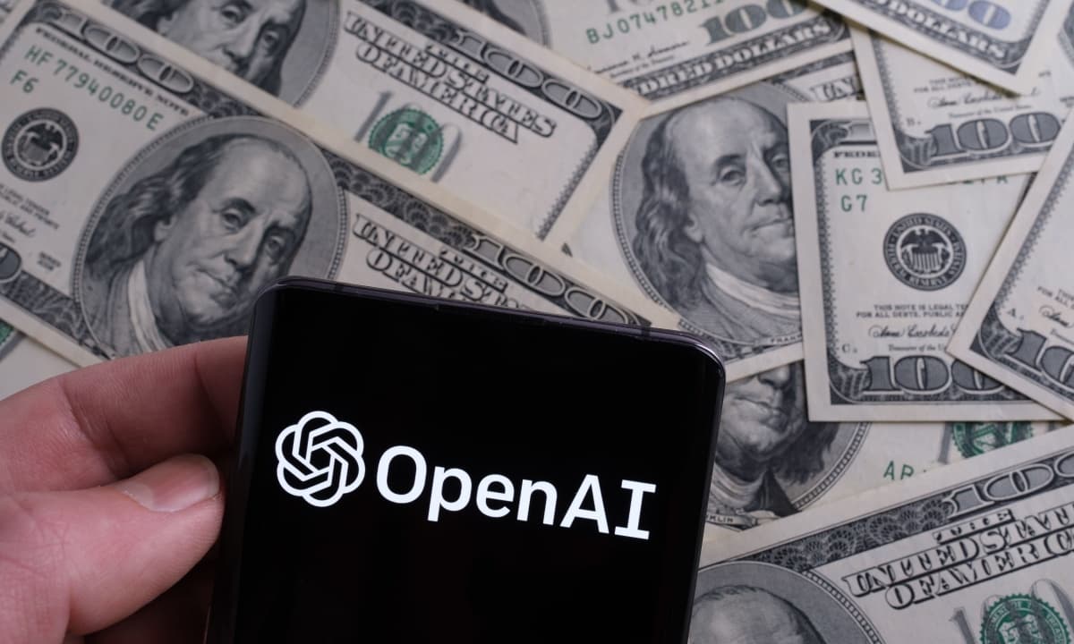 Bank of America building exterior with OpenAI logo overlay, representing a $520 million loan deal ahead of delayed IPO