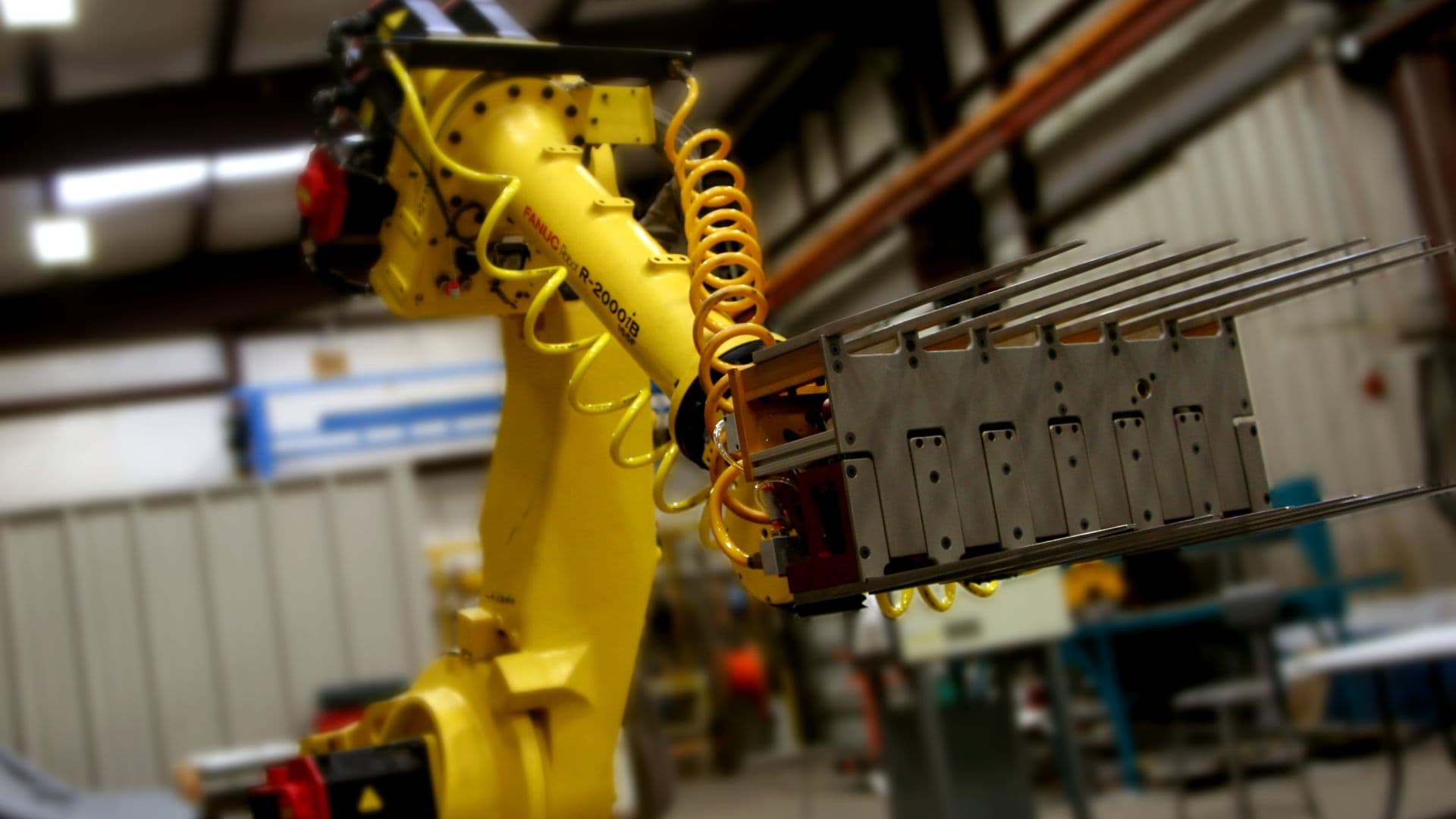 Fanuc robot arms combine AI and computer vision to adopt flexible workflows