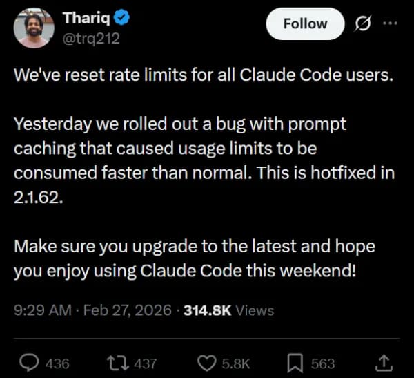 Laptop screen showing Claude AI chat interface with a red usage limit warning banner, user staring at the exhausted…