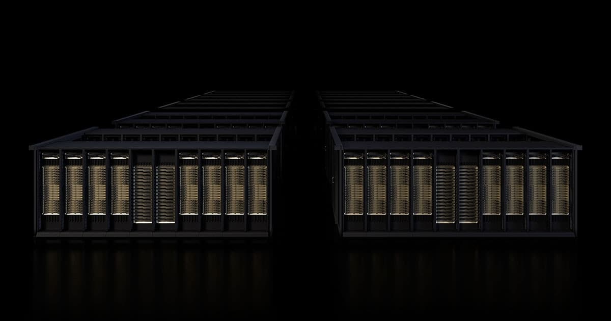 A server rack with glowing blue lights and cables, representing Nvidia's AI data center blueprints for 4-node to…